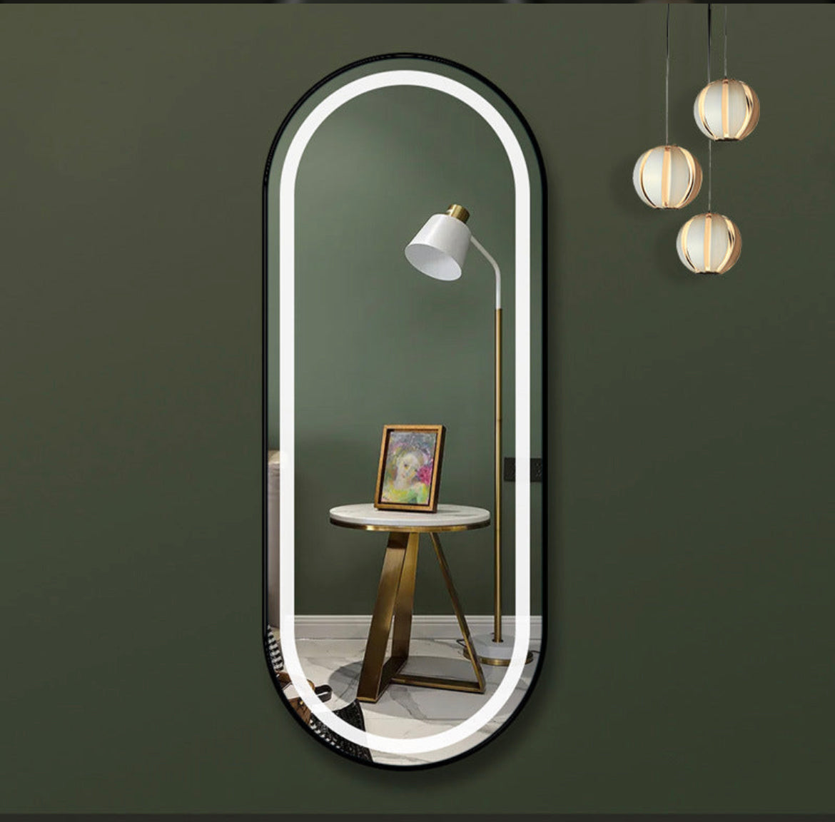 Black frame oval mirror