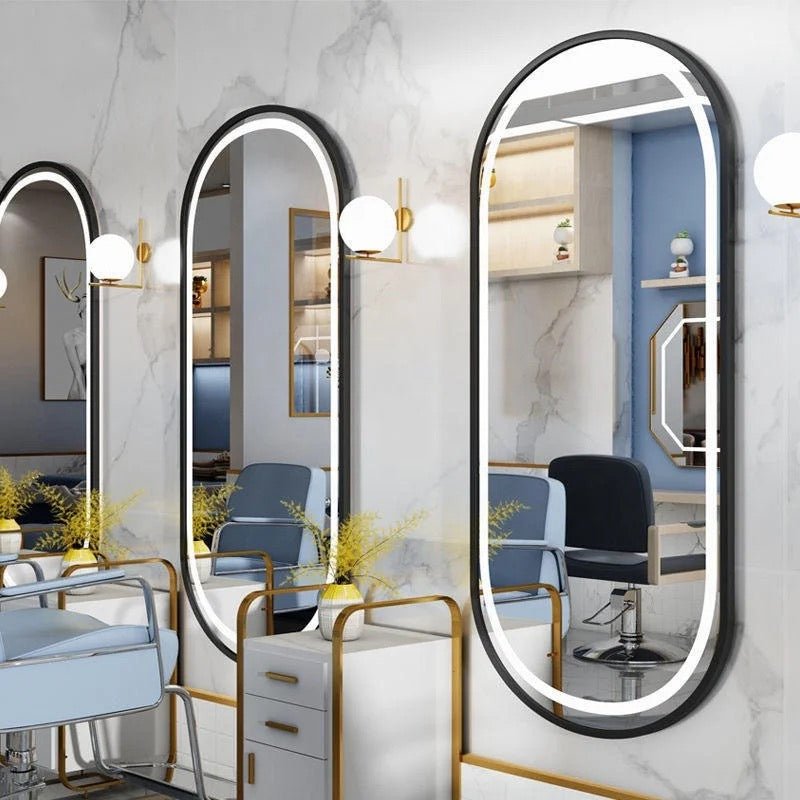 Black frame oval LED wall mirror
